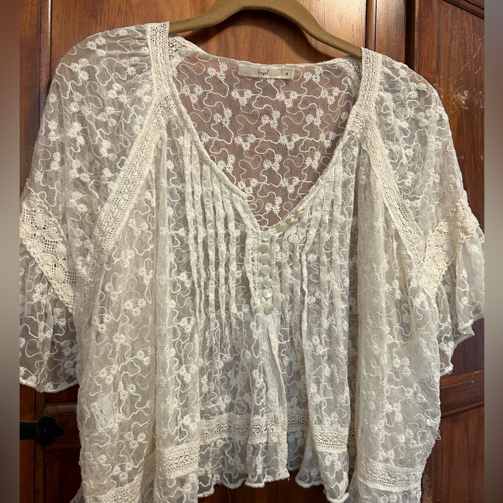 Hazel brand layering top buttons at the front can be open layered or buttoned.